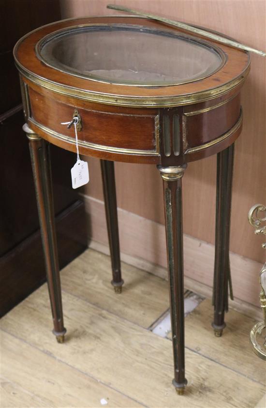 A French brass bound mahogany display table